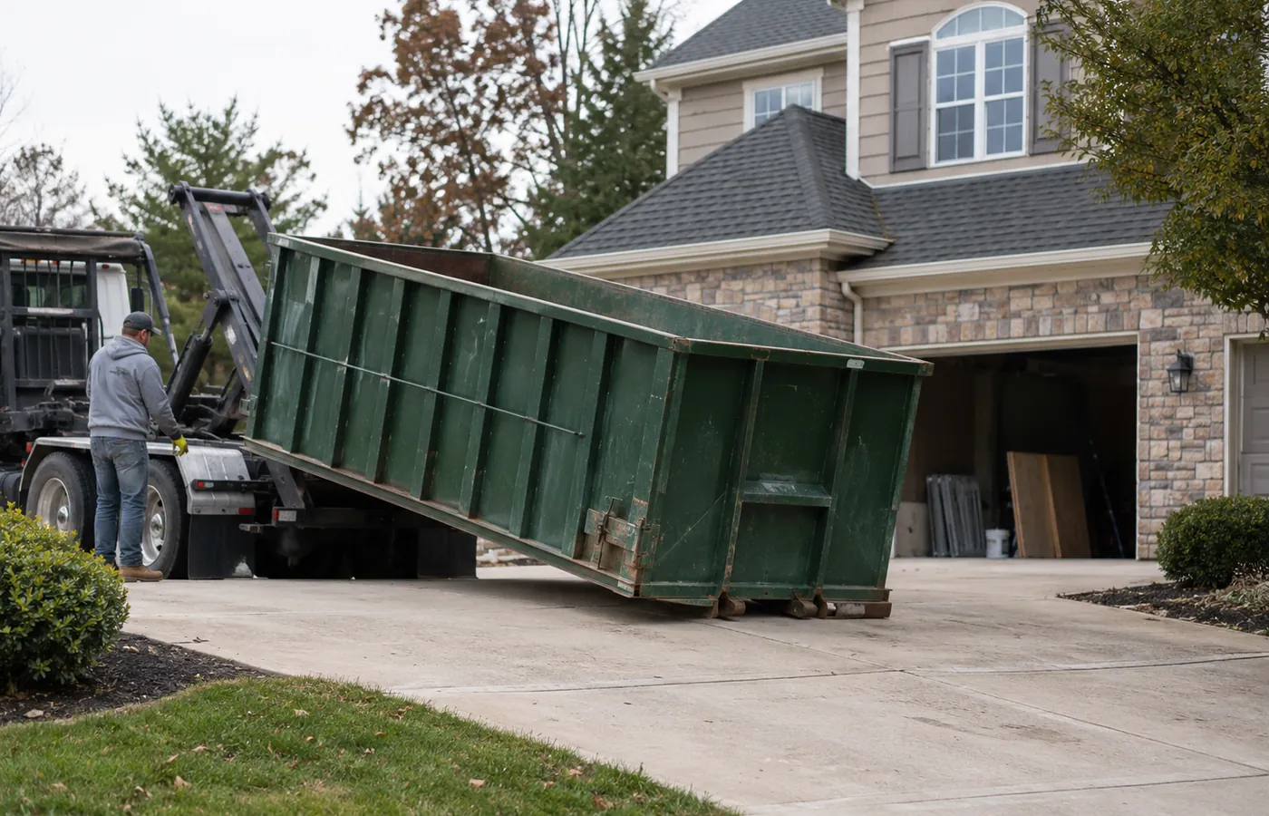 Residential Dumpster Rental in Thornton - CO set beside a home during a garage cleanout project, Residential Dumpster Rental in Broomfield - CO set beside a driveway during a household cleanout